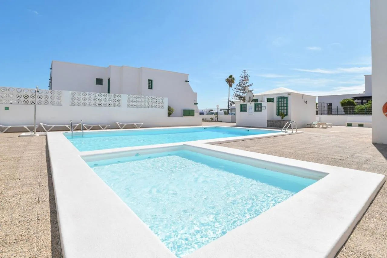 Apartamento Las Mimosas. Bajo con Wifi. Piscinas comunitarias Tías 0*,